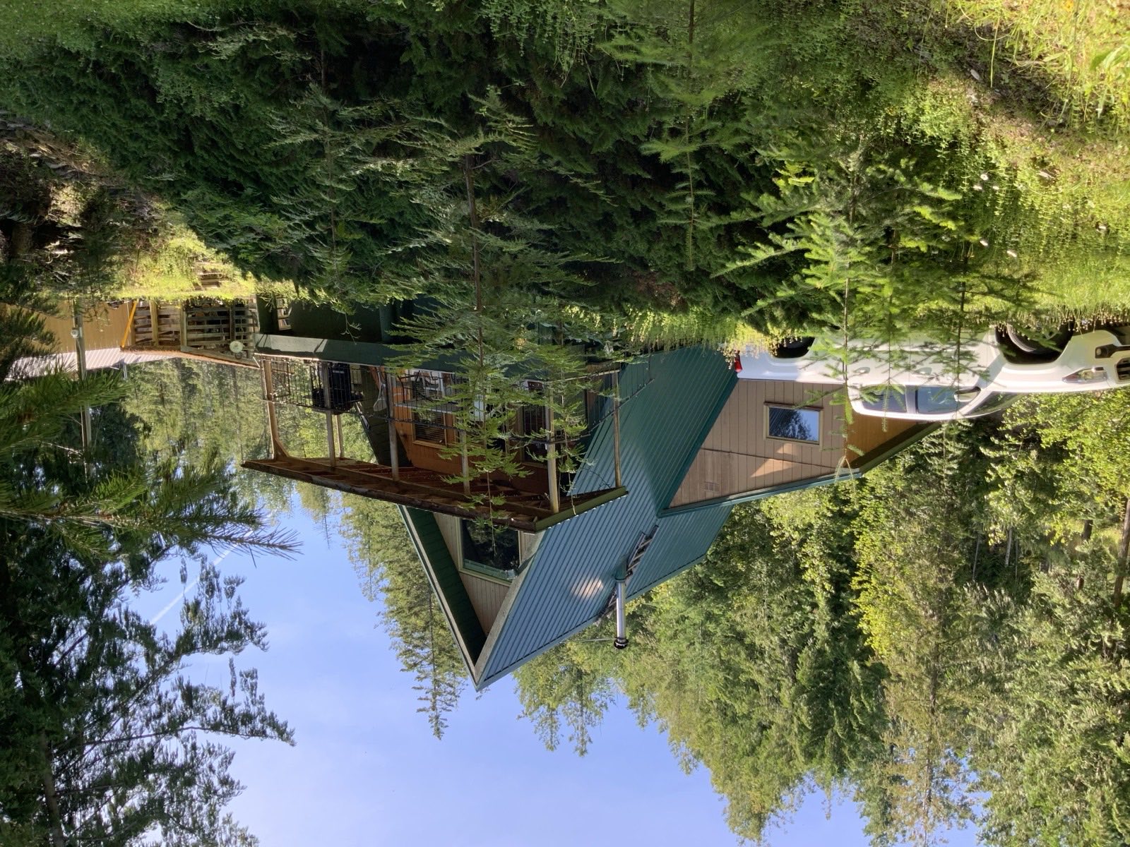 A-frame cabin in the trees during a seasonal dwelling pre-purchase inspection